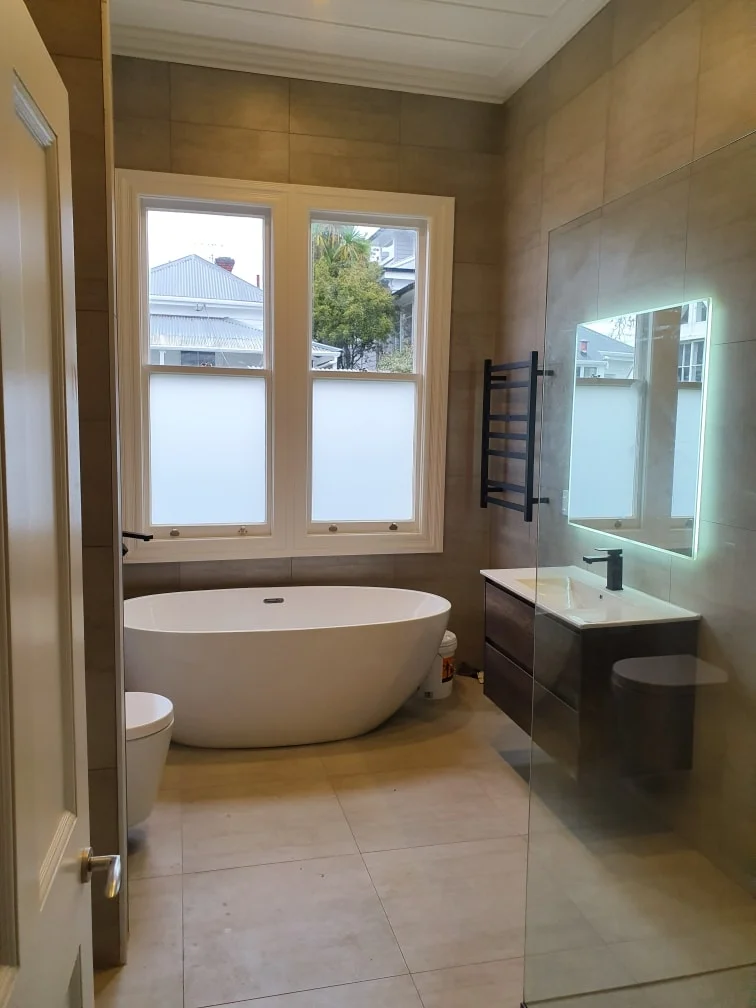 Bathroom renovation with LED mirror and heated towel rail — Westside Electrical