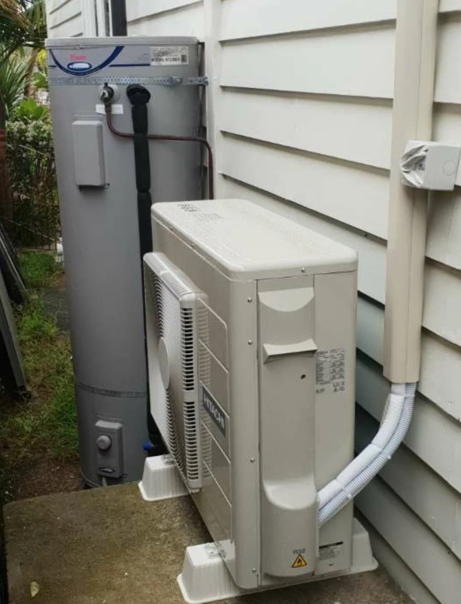 Heat pump outdoor unit installed at Auckland home by Westside Electrical